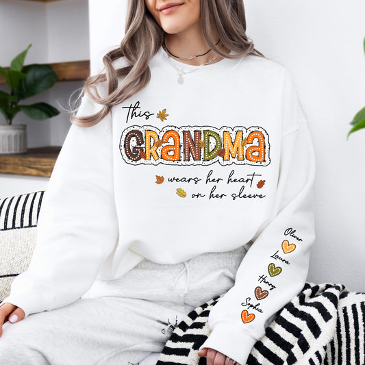 Personalized Gift For Grandma - Grandma Wears Her Heart On Her Sleeves - Custom Name Christmas Shirt