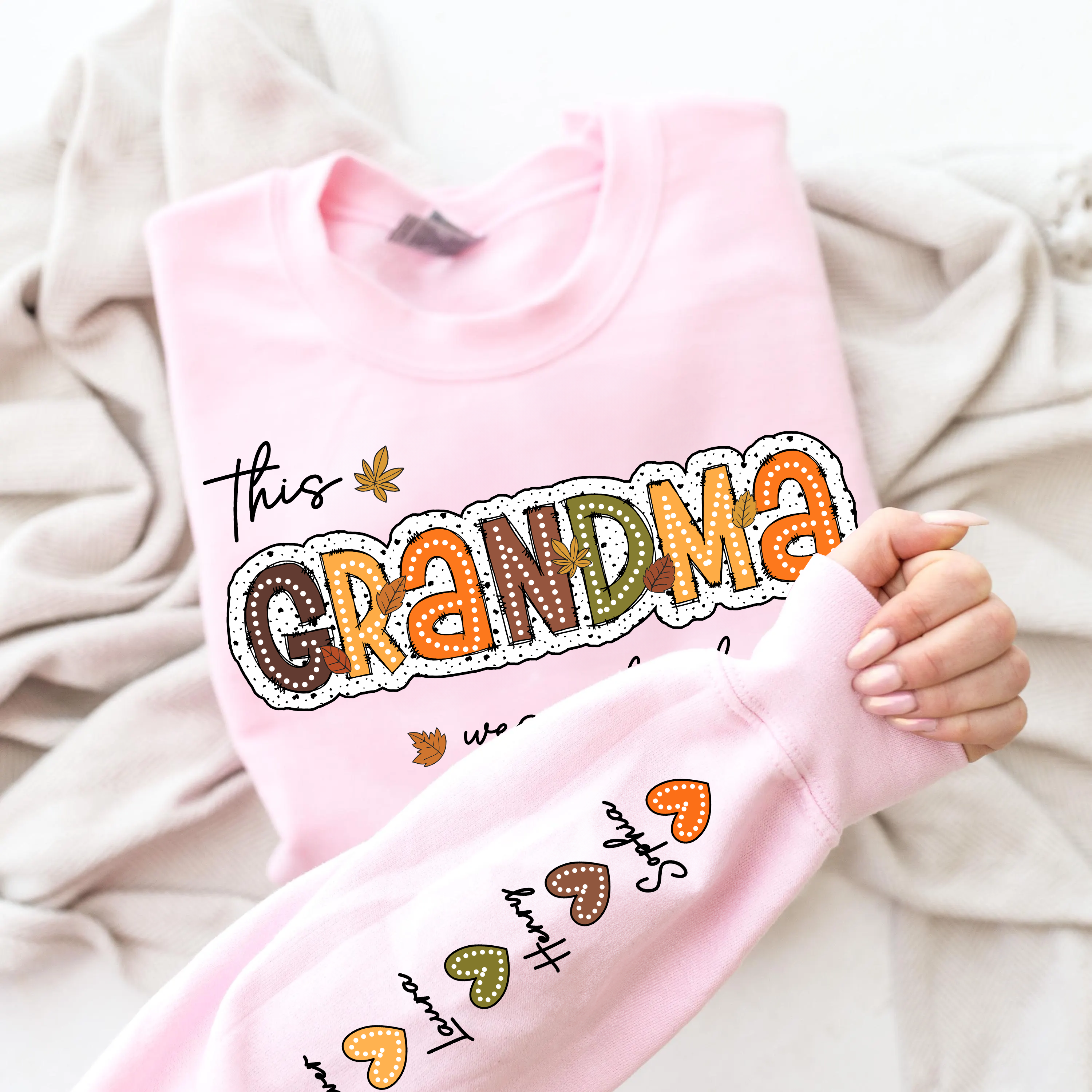 Personalized Gift For Grandma - Grandma Wears Her Heart On Her Sleeves - Custom Name Christmas Shirt